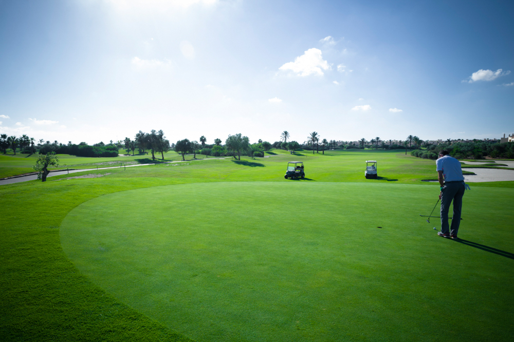 Person playing golf at Roda Golf Course