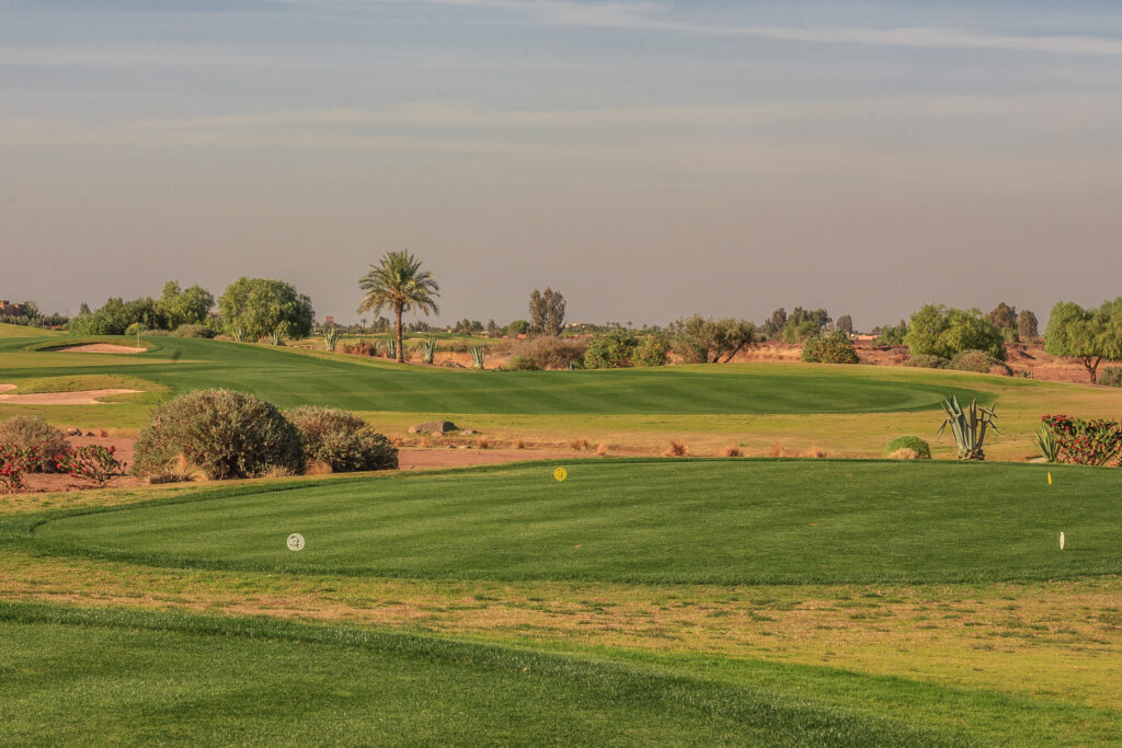 Tee box at Samanah Golf & Country Club with trees around