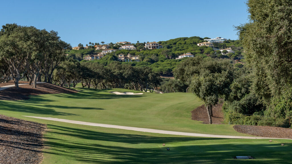 Fairway with bunkers and trees around at San Roque - The Old Course