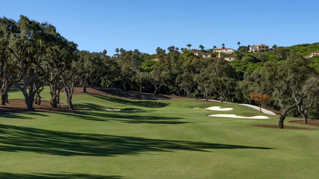 Fairway with trees and bunkers at San Roque - The Old Course