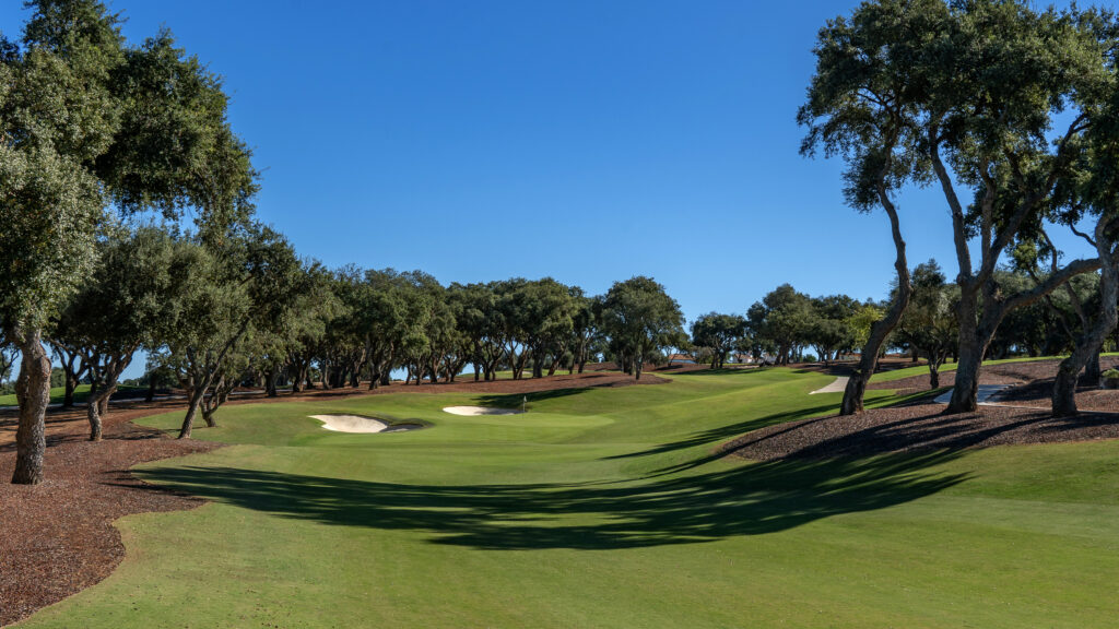 Fairway with trees and bunkers at San Roque - The Old Course