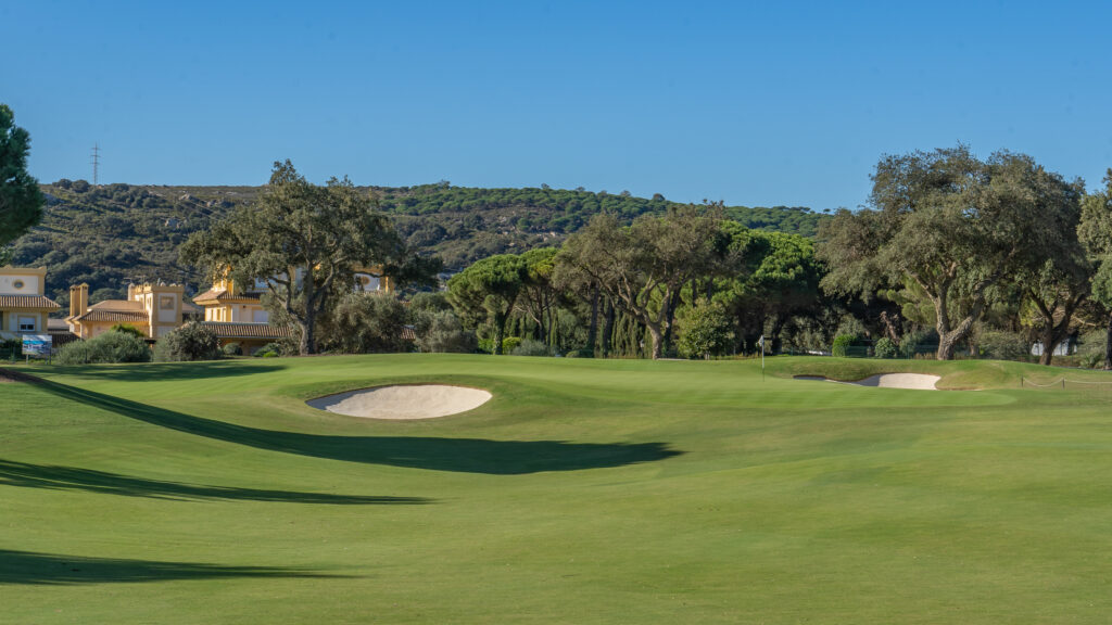 Fairway with bunker and trees around at San Roque - The Old Course