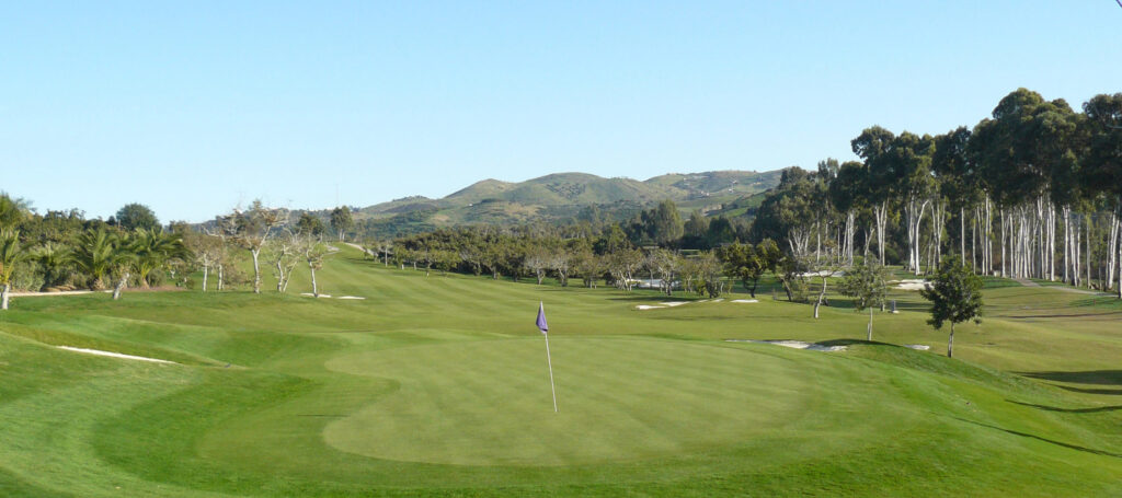 Hole with trees around at Santana Golf Course