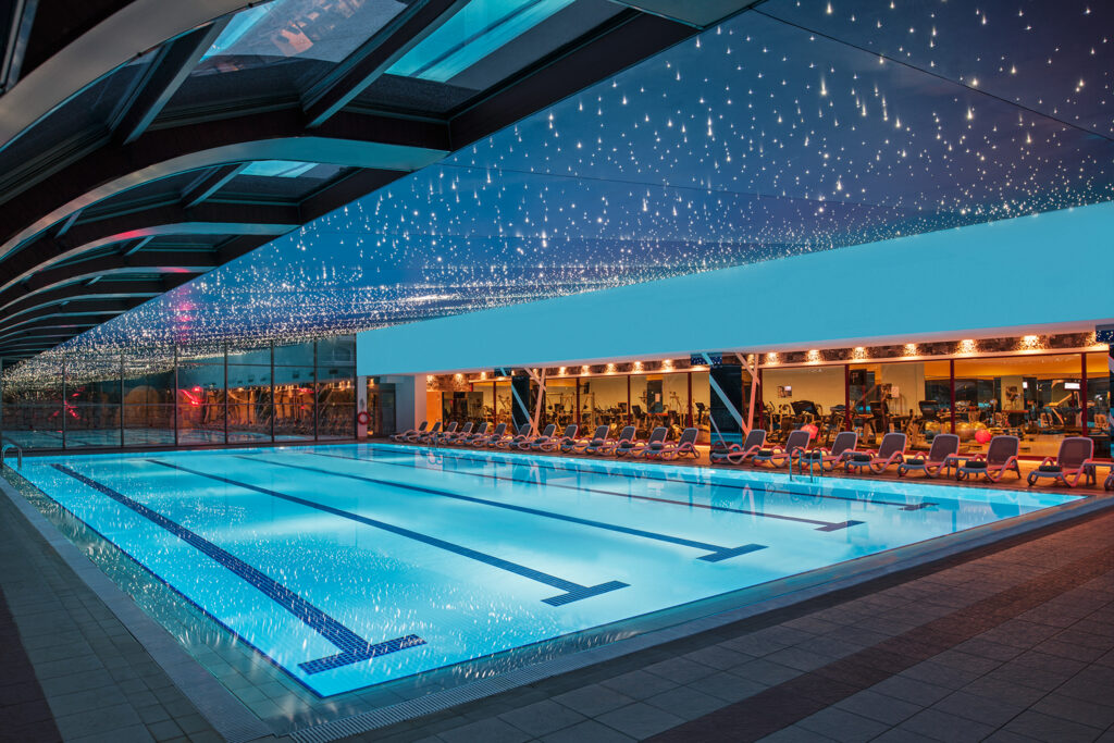 Indoor pool with twinkling lights above at Sirene Belek Hotel