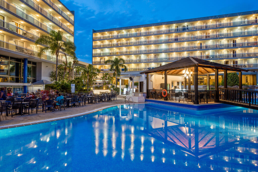 Outdoor pool at Sol Costa Daurada at night