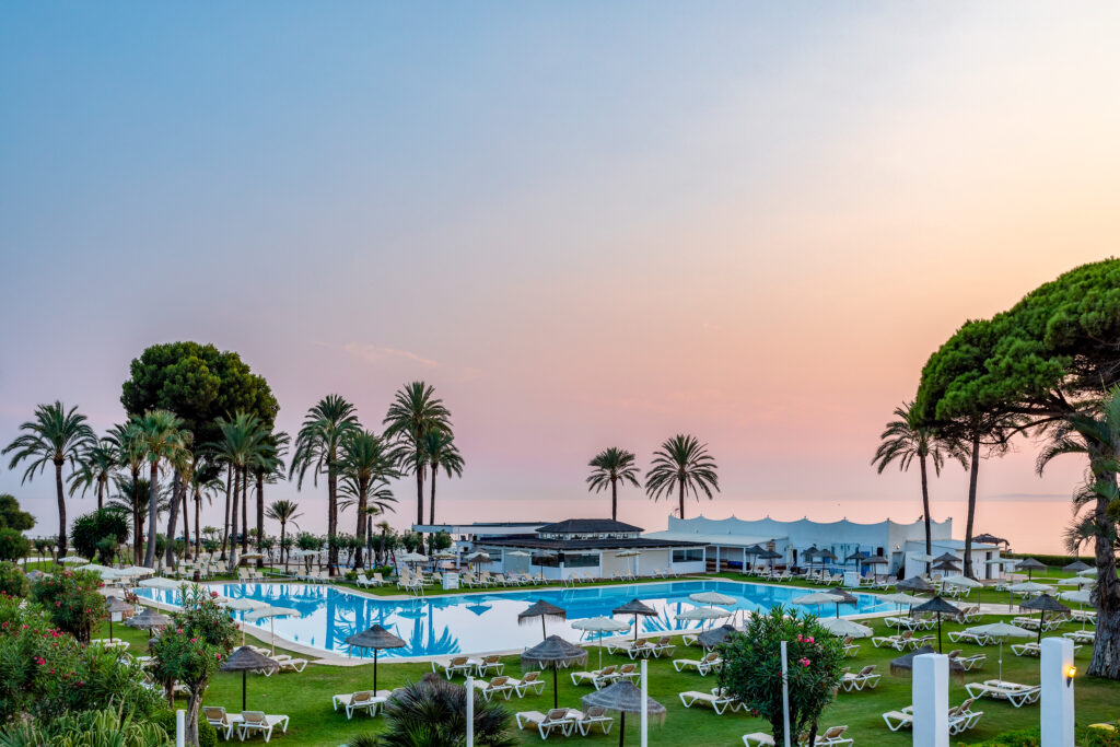 Outdoor pool at Sol Marbella Estepona Atalaya Park at sunset