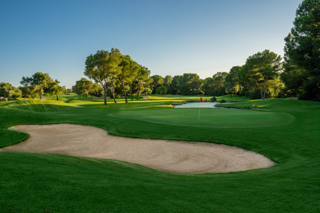 Hole with bunker and trees in background at Son Antem - West Course