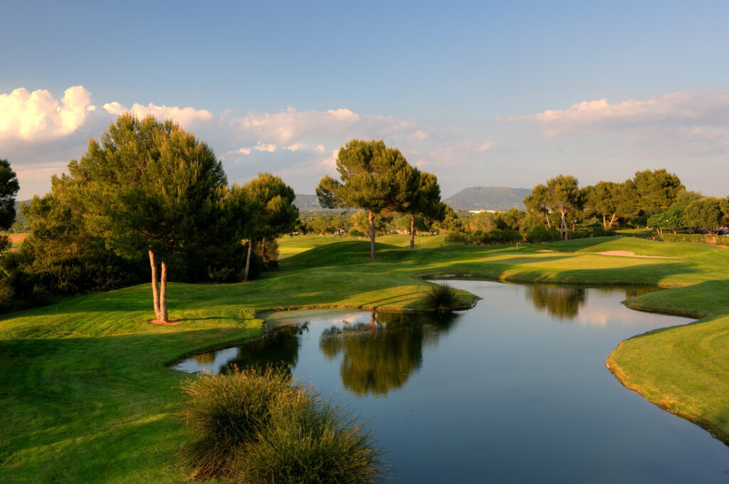 Lake on fairway with trees around at Son Antem - West Course