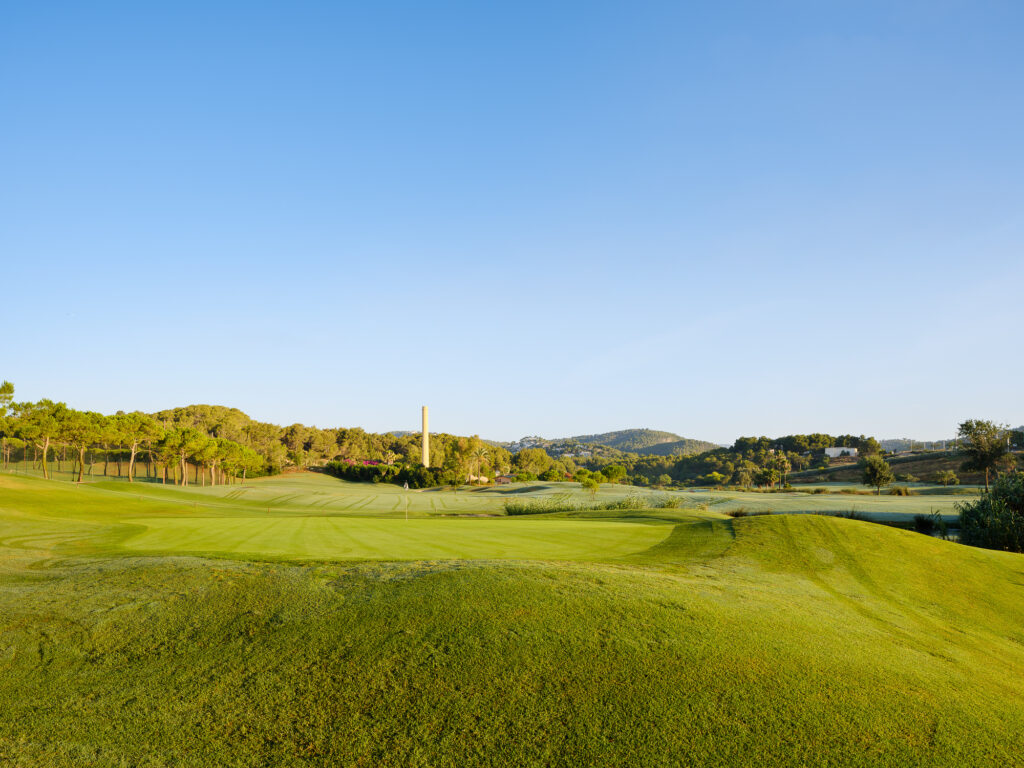 Hole with trees in background at Son Muntaner Golf Course