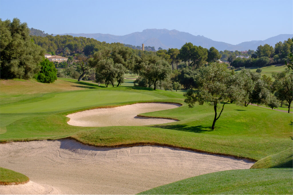 Bunkers on fairway with trees around at Son Muntaner Golf Course