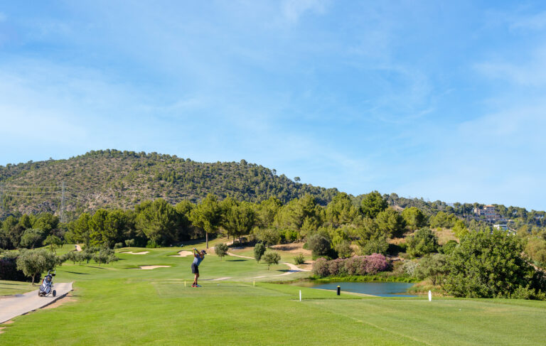 Person playing golf at Son Quint Golf Course