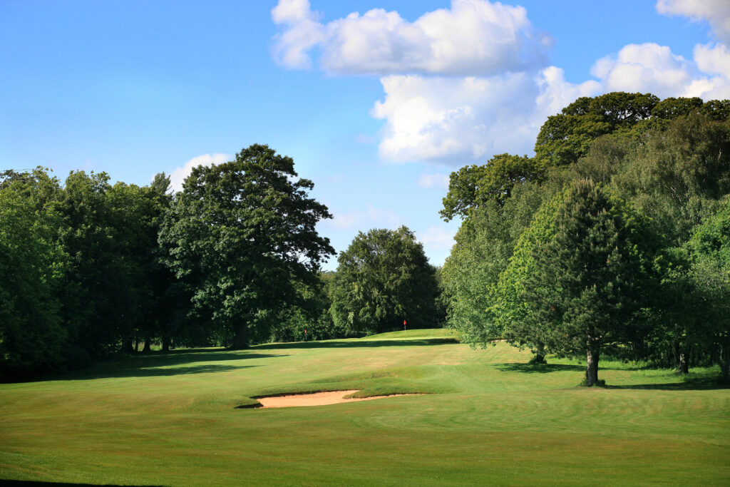 Bunker on fairway at St Pierre - Mathern Course with trees around