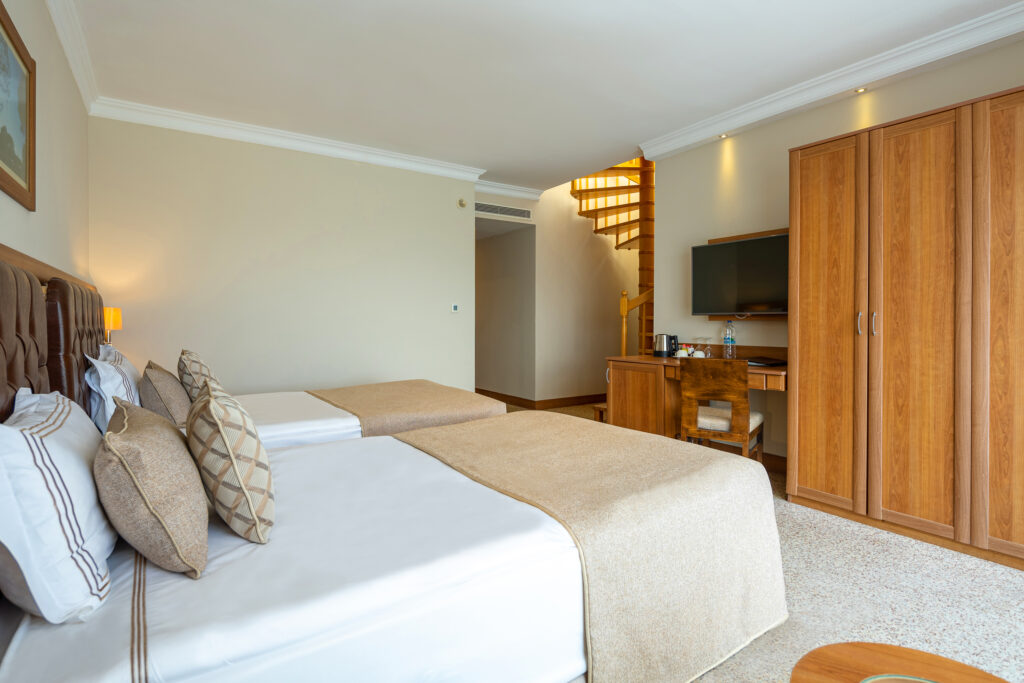 Twin bed accommodation at Sueno Hotels Golf Belek