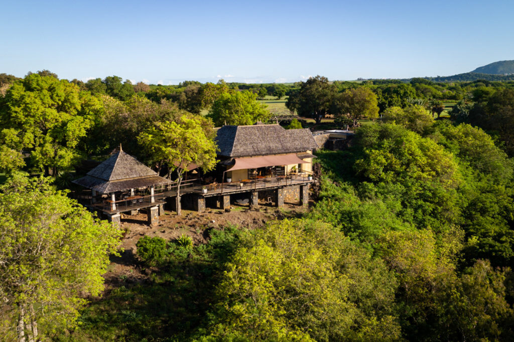 Building at Tamarina Golf Club with trees around