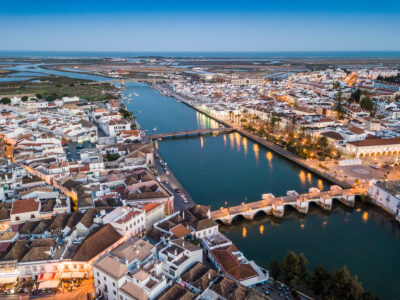 evening picture overview of tavira town with rive running through the middle