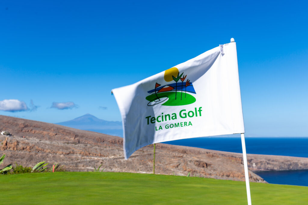 Tecina Golf flag with ocean in background