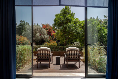 Loungers on a decking area at Thanos Hotel Almyra