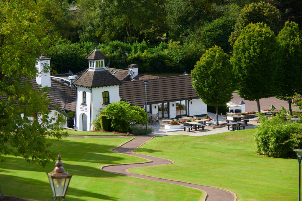 Exterior of building at The Culloden Estate & Spa with trees around