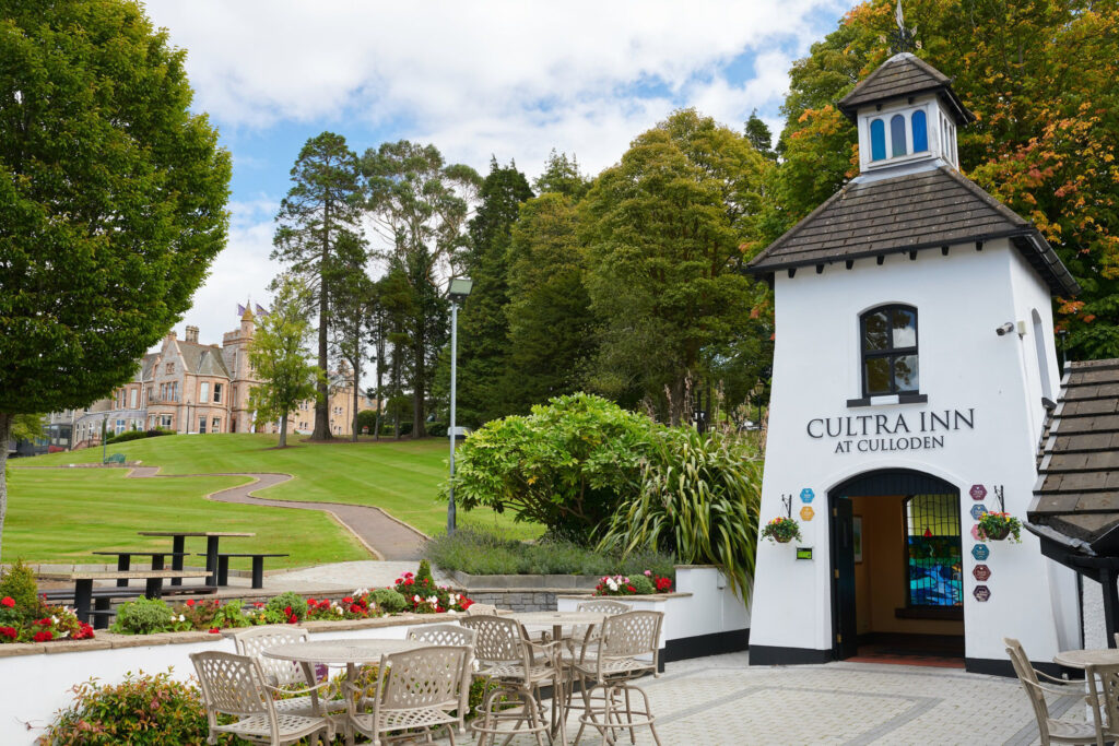 Exterior of building at The Culloden Estate & Spa with trees around