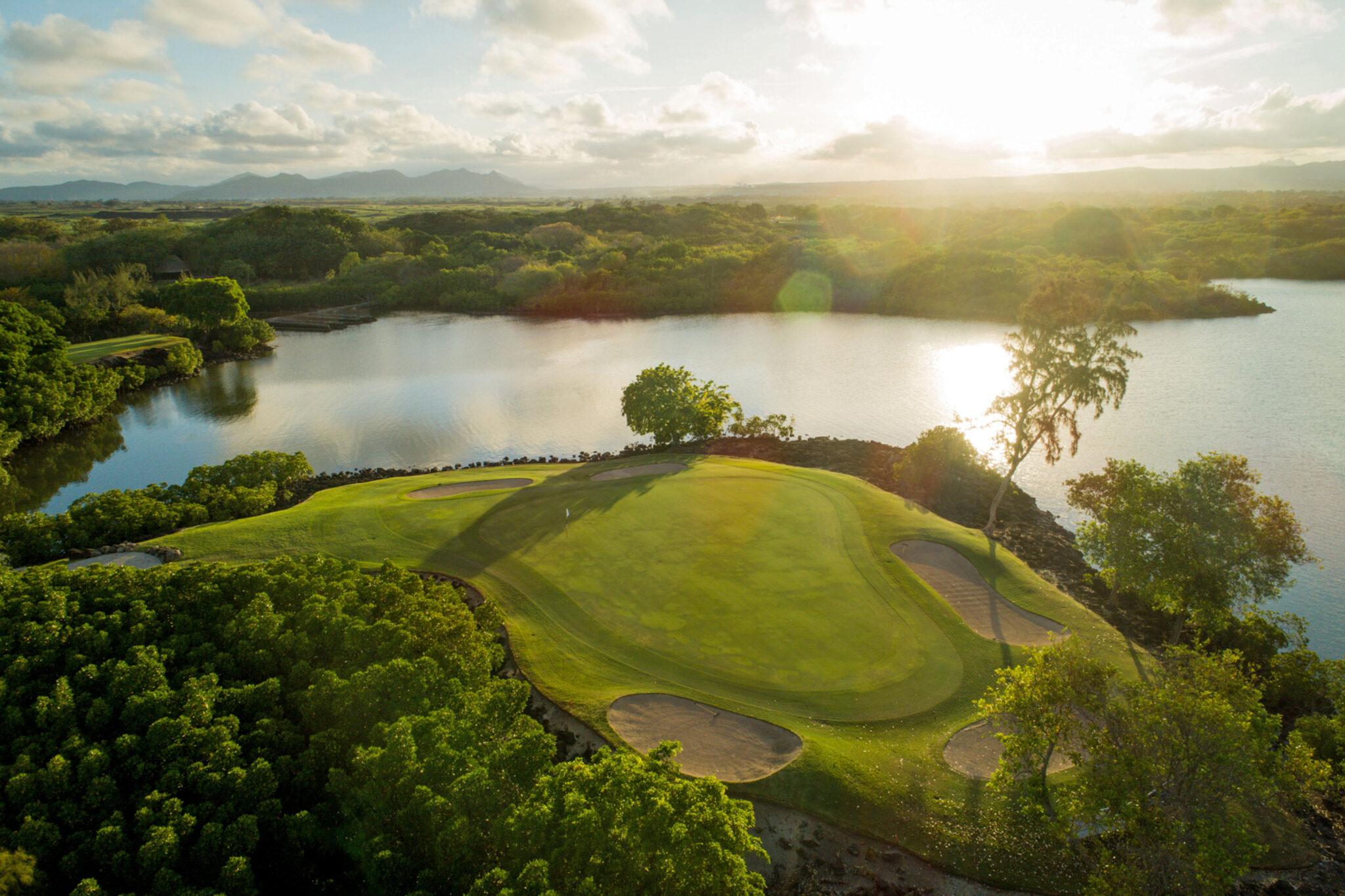 Hole with bunkers and a lake at The Legend Golf Course