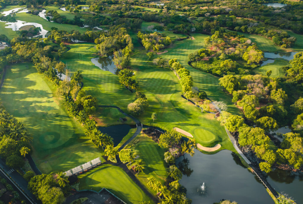 Aerial view of The Legend Golf Course with lakes and trees around