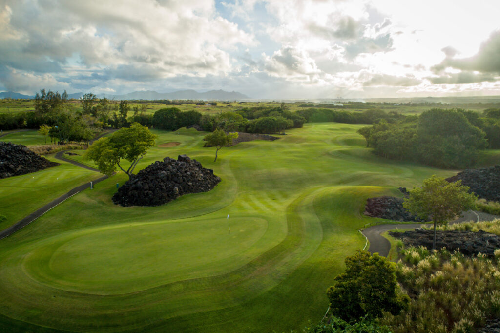 Hole with white flag at The Links Golf Course with trees around