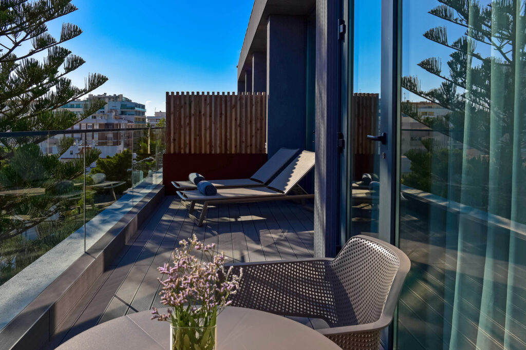 Balcony with sun loungers at The Prime Energize Monte Gordo