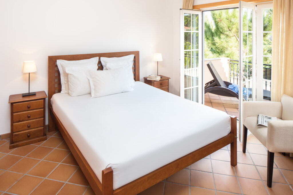 Double bed accommodation with balcony at Praia d’el Rey - The Village Resort