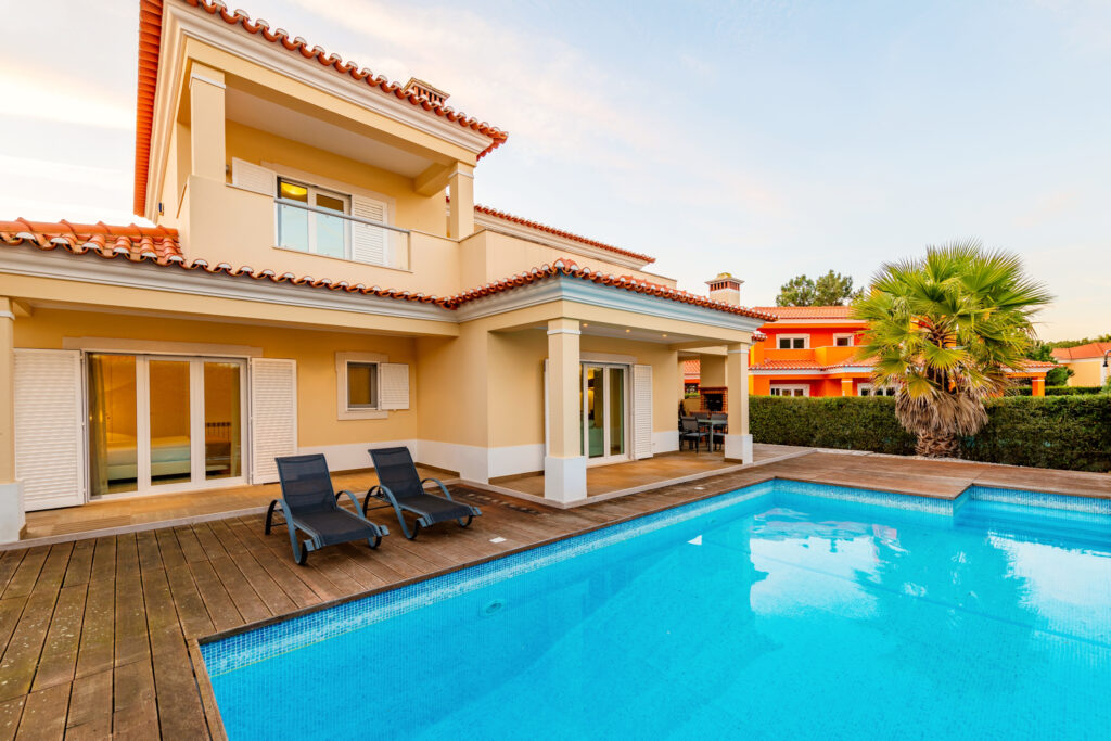 Exterior of the villa with outdoor pool at Praia d’el Rey - The Village Resort