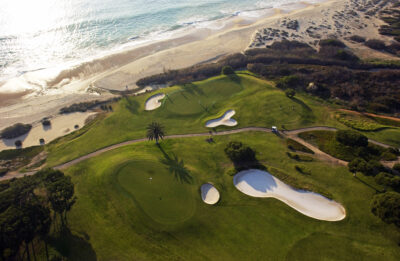 Aerial view of Vale do Lobo Ocean Golf Course with beach in view