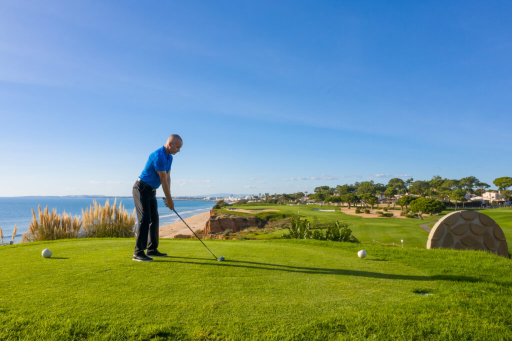 Person teeing off at Vale do Lobo Royal Golf Course