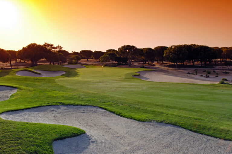 Fairway with bunkers and trees around at Vale do Lobo Royal Golf Course