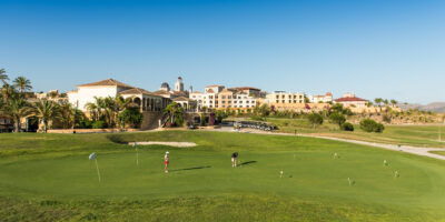 People practicing on the practice facilities at Villaitana - Levante Course