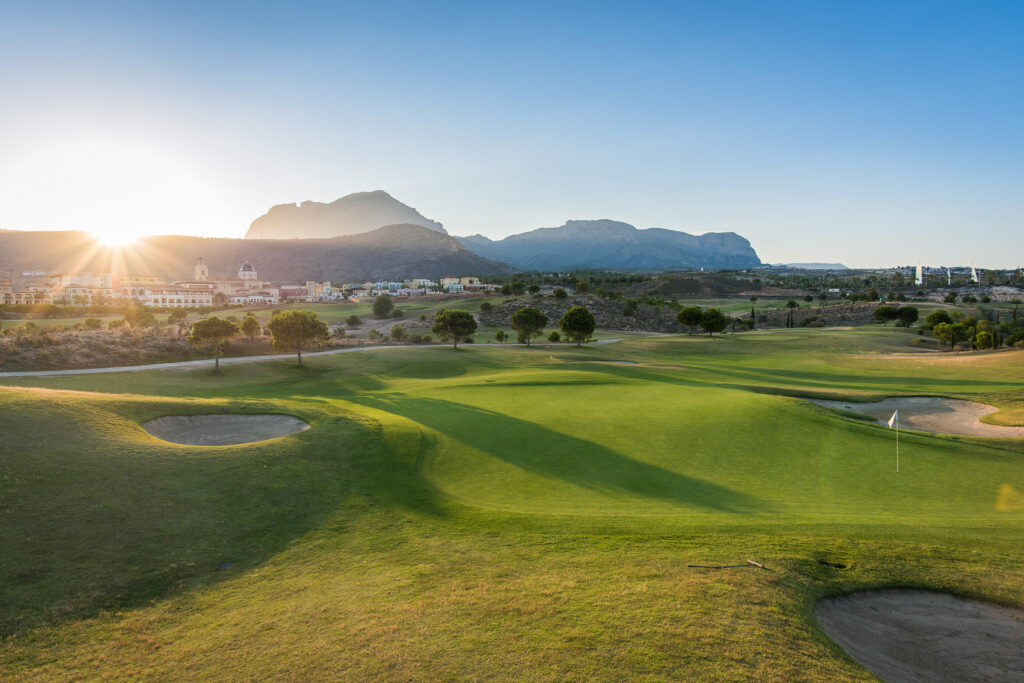 A hole with bunkers and hills in background at Villaitana - Levante Course