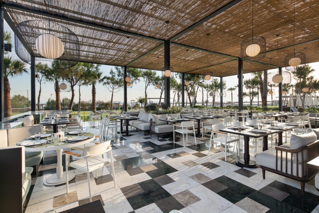 Outdoor dining at Voyage Belek Golf & Spa