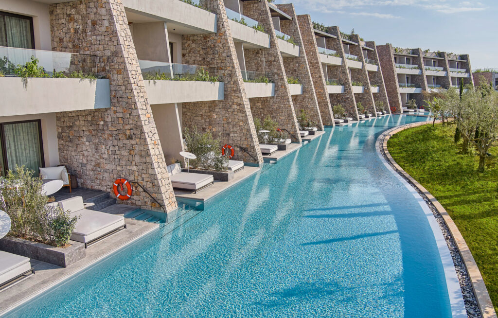 Exterior of poolside accommodation at W Costa Navarino