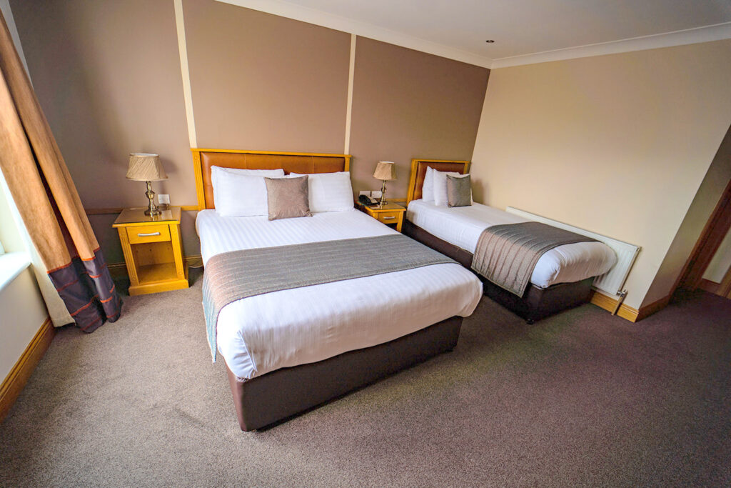 Accommodation with a double and single bed at Ballyliffin Lodge & Spa