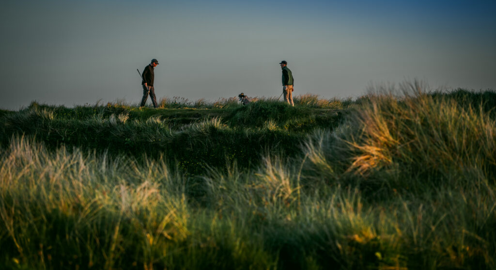 People playing golf at Carne Golf Links