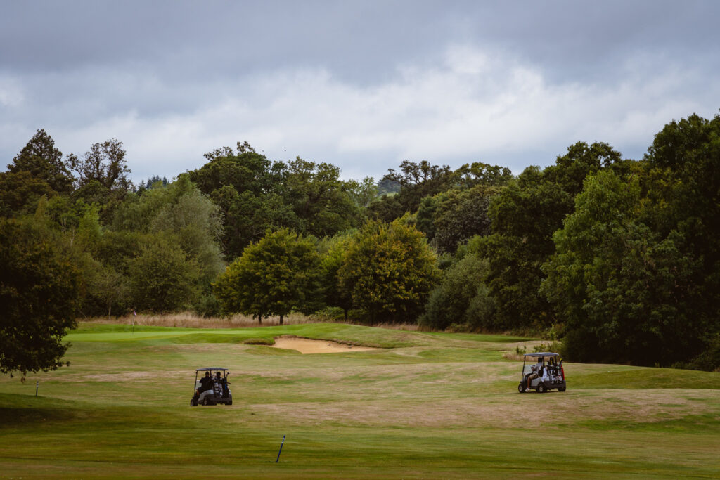 People driving buggies at De Vere Wokefield Estate