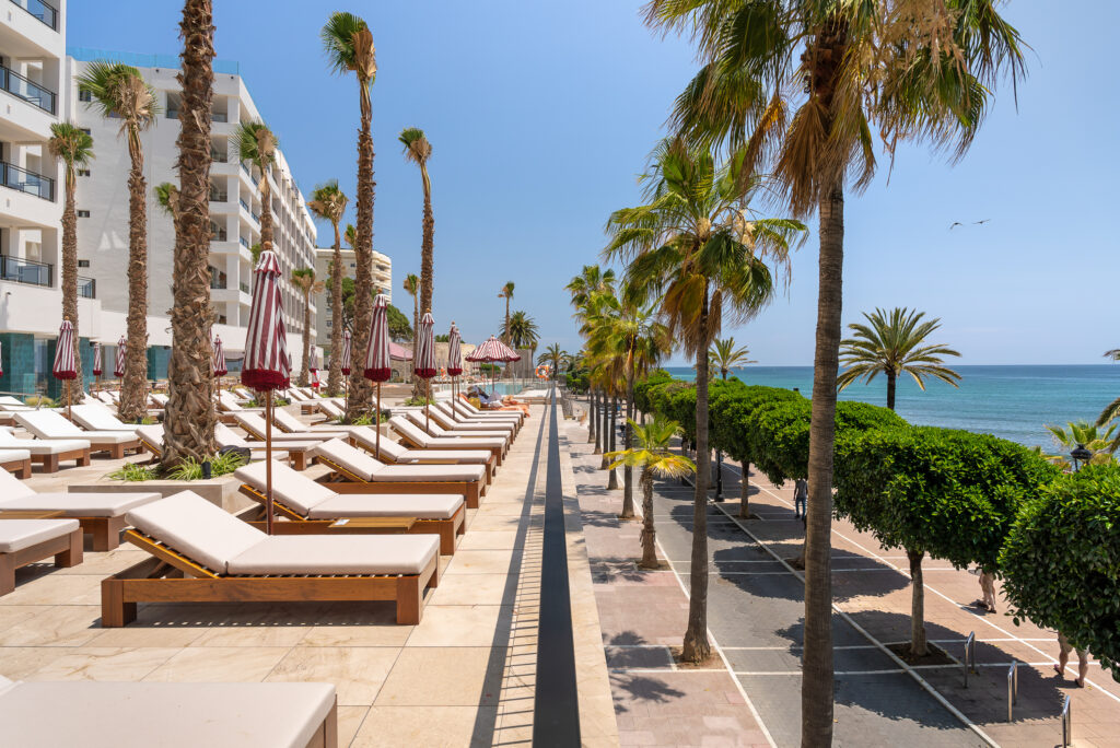 Sun loungers with beach view at El Fuerte Marbella