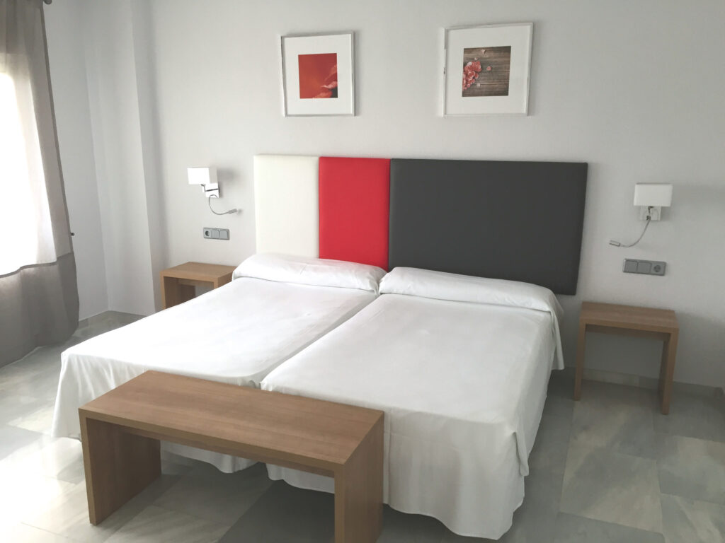 Twin bed accommodation at Flatotel International Hotel