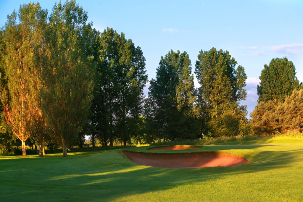 Bunkers on fairway with trees around at Belton Woods - Lakes Course