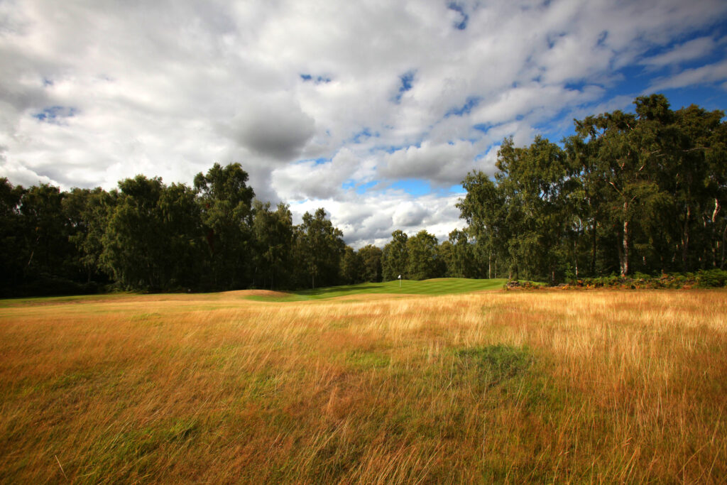 Fairway with hole in distance with trees around at Breadsall Priory - Moorland Course