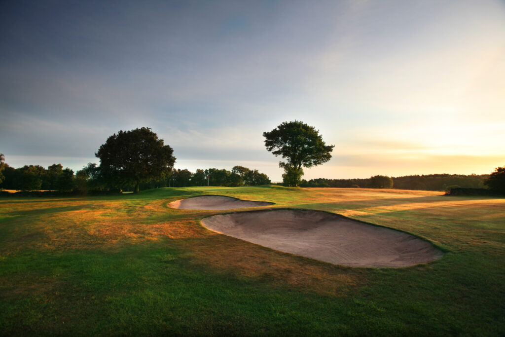 Bunkers on fairway with trees around at Breadsall Priory - Moorland Course