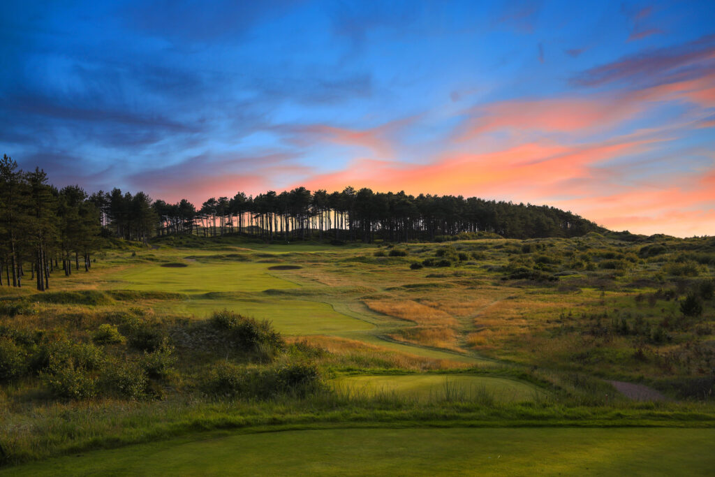 Fairway with trees in background at Formby Golf Club