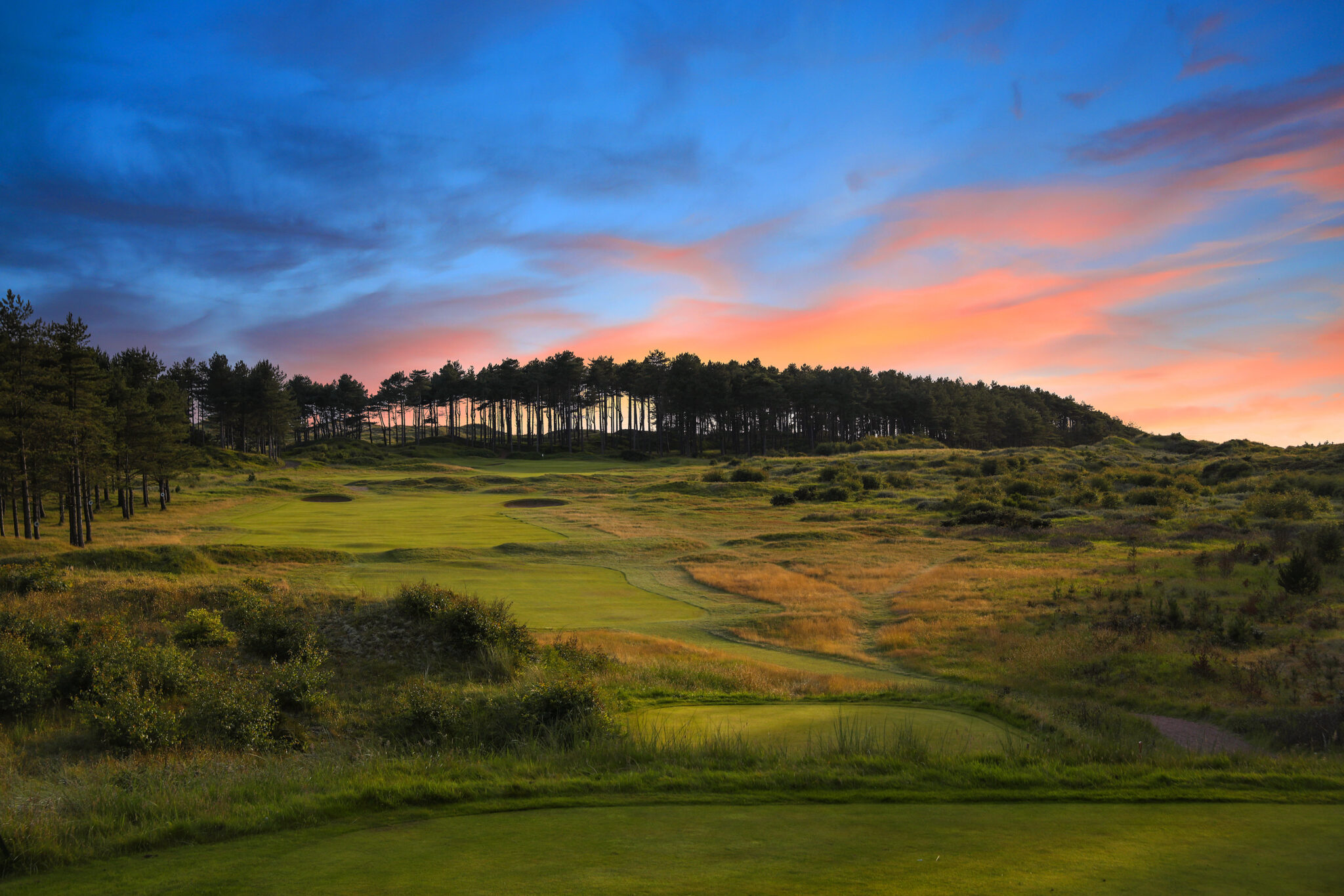 Fairway with trees in background at Formby Golf Club