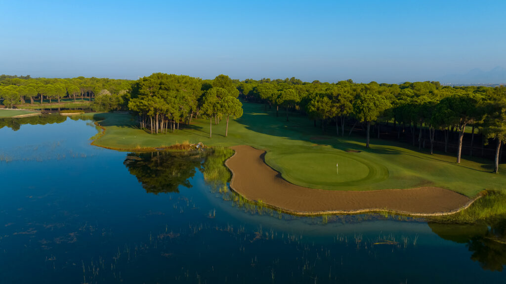 Lake with bunker and trees around at Gloria - Old Golf Course