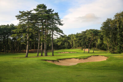 Bunkers on fairway at Hardelot - Les Pins Course with trees around