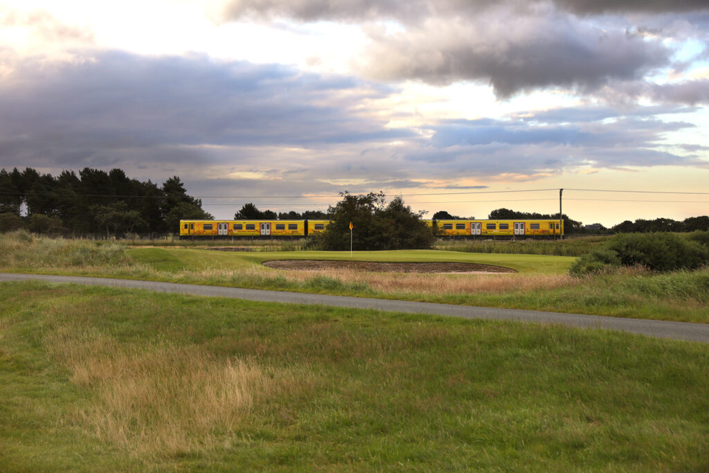 Train going through Hillside Golf Club