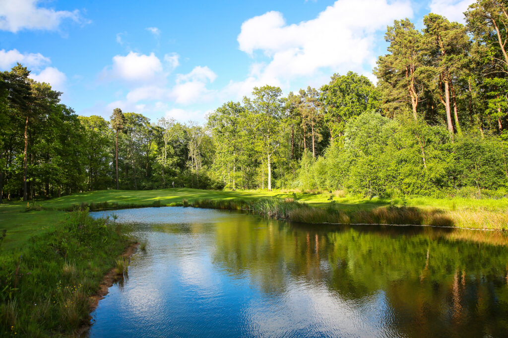 Lake on fairway with trees around at Macdonald Linden Hall Golf Course